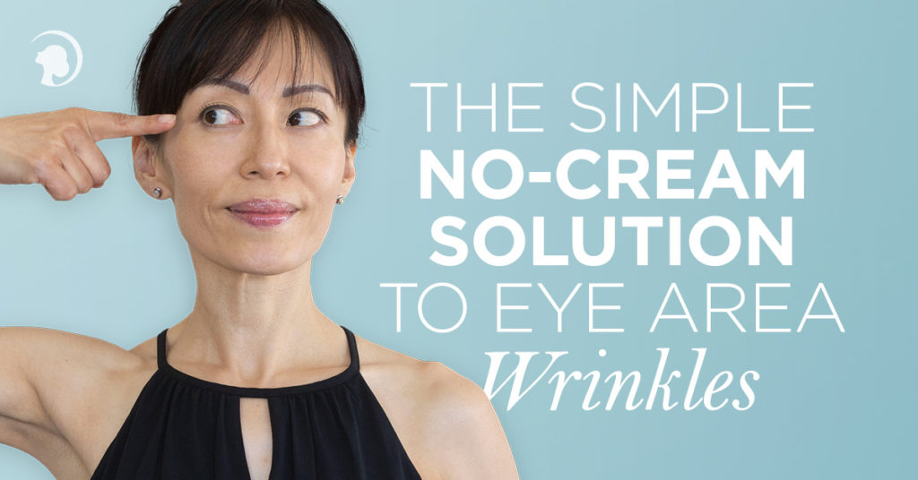 Fumiko Takatsu holding a finger on her right eye and looking to the side - showing an exercise for eye area wrinkles.